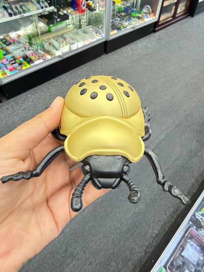 Yellow ladybug herb grinder - DayDreamz Smoke Shop