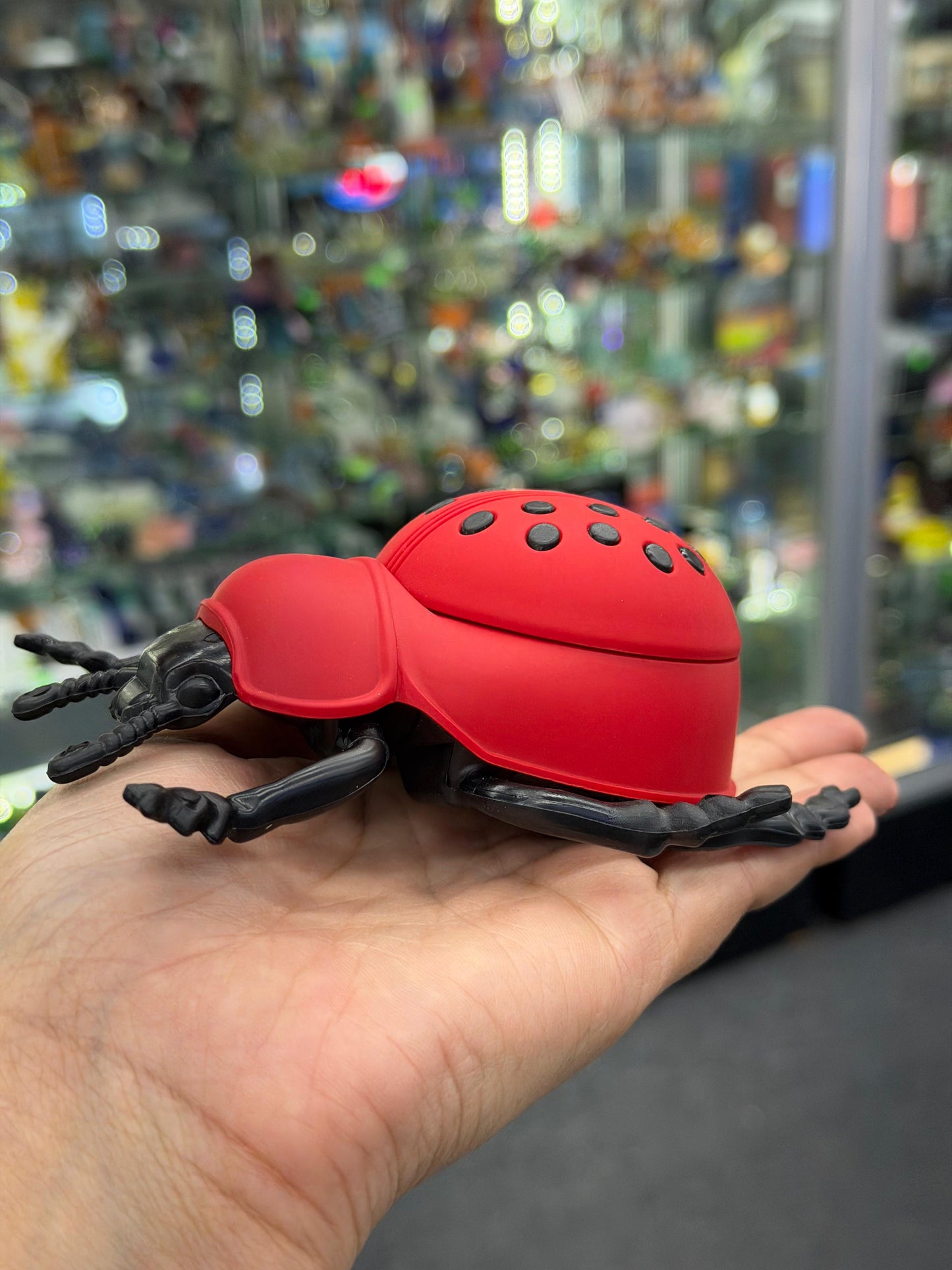Red ladybug herb grinder - DayDreamz Smoke Shop