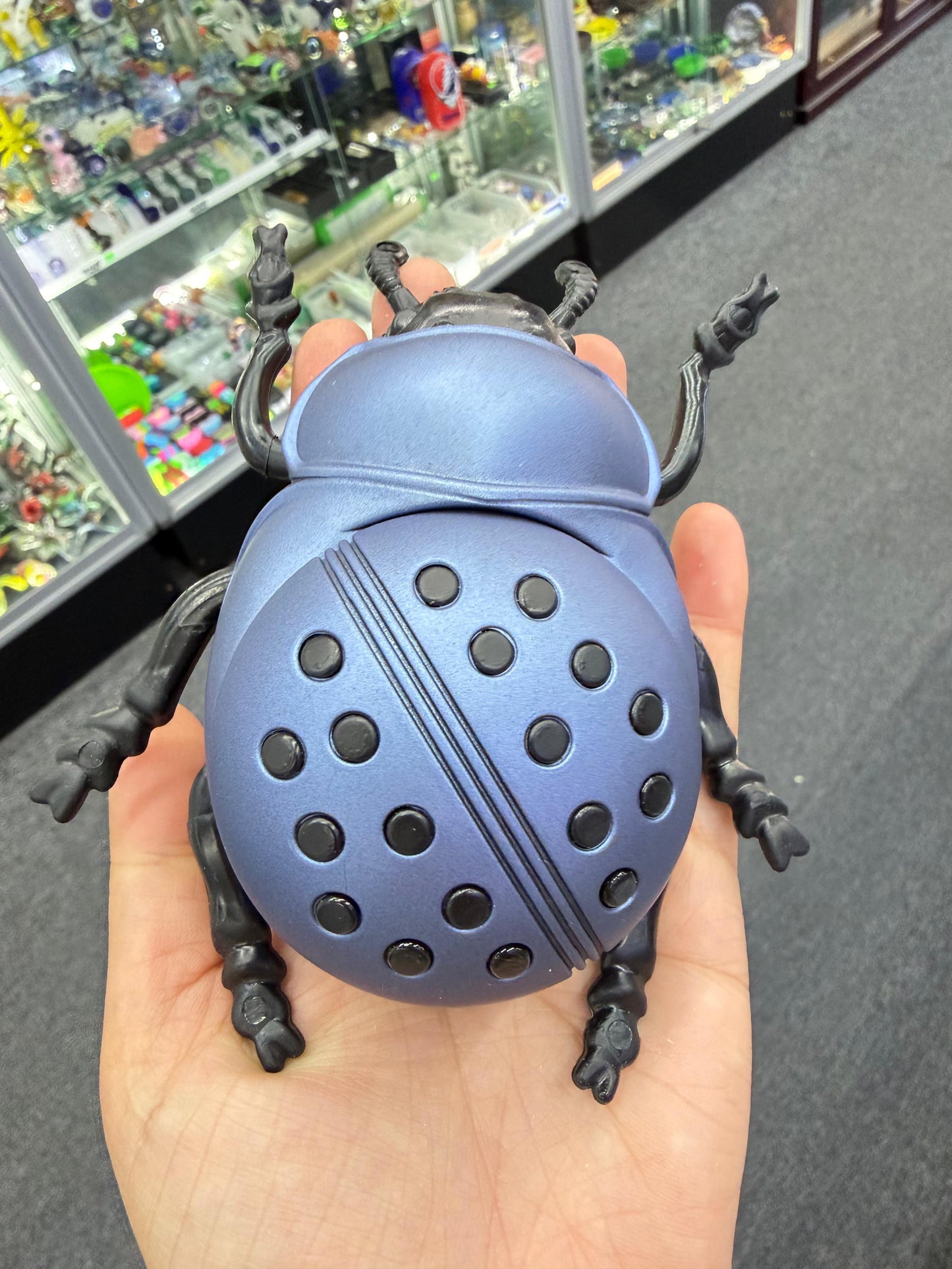 Gray ladybug herb grinder - DayDreamz Smoke Shop