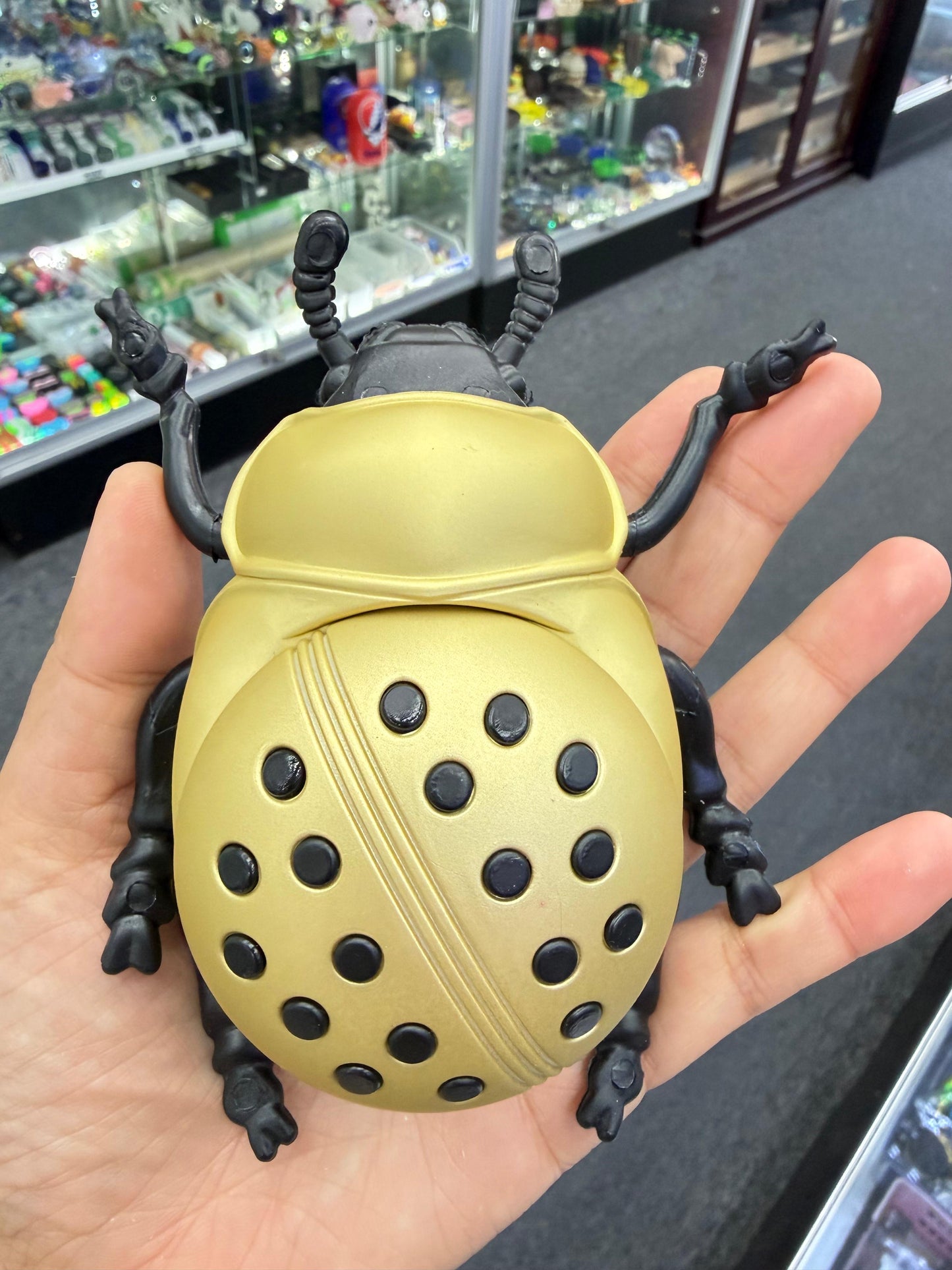 Yellow ladybug herb grinder - DayDreamz Smoke Shop