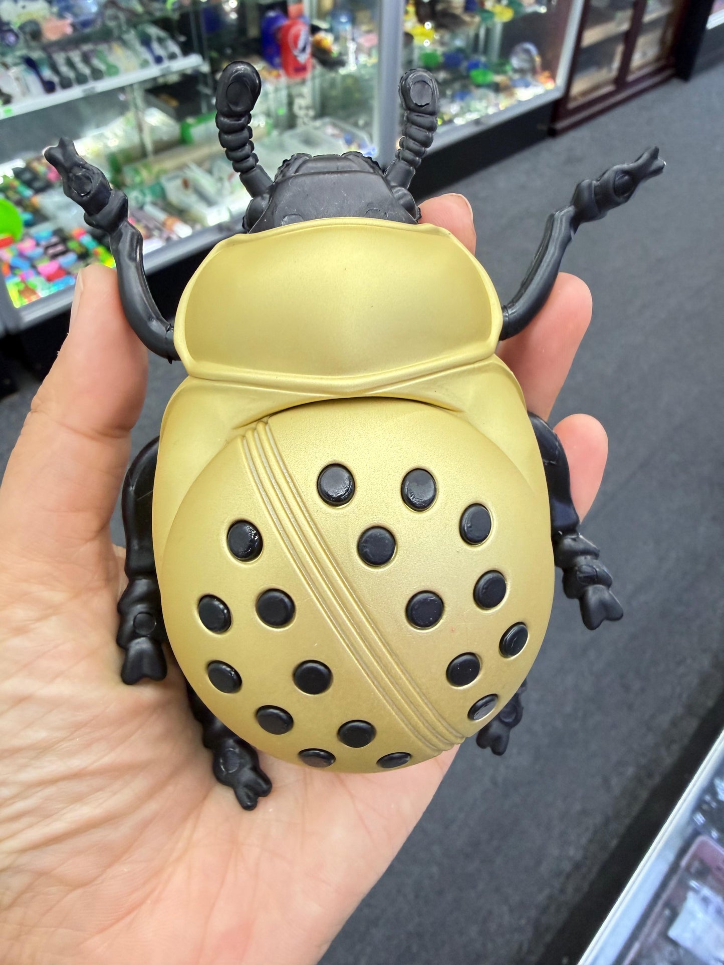 Yellow ladybug herb grinder - DayDreamz Smoke Shop