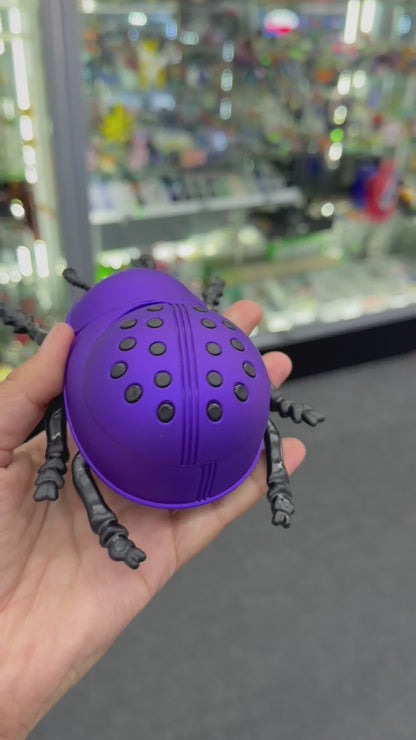 Purple ladybug herb grinder